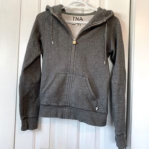 TNA zip up